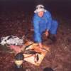 This is me.....GeoFisher cleaning a mess of walleye.    I brought a separate set of vinyl raingear to clean fish.  I put the raingear over my clothes, then clean away.  I find that this keeps my clothes cleaner.   After cleaning the fish, I simply hang the gear up, and let it dry for the next time.