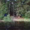 This is yet another Zephyr campsite picture.  Notice the bright blue patch in the trees.  This is the raingear that I used to clean fish.  It is hanging up to try.  Hopefully it will be used to clean fish that are currently being caught.