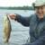 Eddie with a whitefish.......I think.  We've caught 2 or three of these in the past.  I've never cleaned one, but I'm thinking I might try.