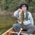 Another really nice smallie.  Notice the water behind me in this picture.  It is crystal clear.  And in this particular pic, those rocks are covered by nearly 6 ft of water.  TALK about Spooky fish.