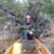 Eddie in front of a crazy BIG rootball on Quetico Lake.